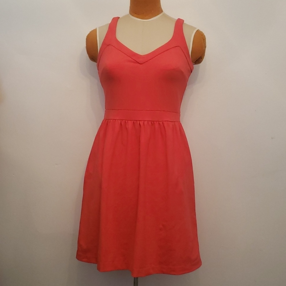 Coral racerback sheath dress with pockets
